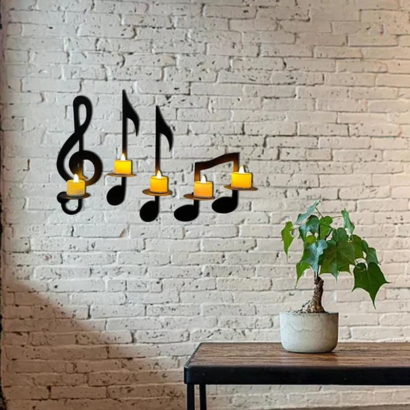 Elegant metal music note wall sconce designed to hold a pillar candle, modern decor