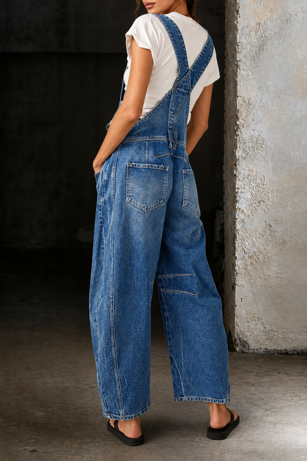 Comfortable & stylish women's blue barrel leg baggy overalls. Relaxed fit jumpsuit for trendy everyday casual wear.