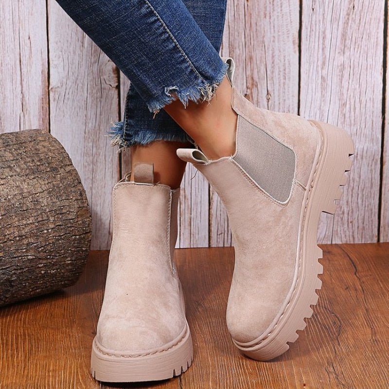 Trendy women's platform Chelsea boots, perfect for elevated streetwear fashion. Features elastic side panels & chunky sole.