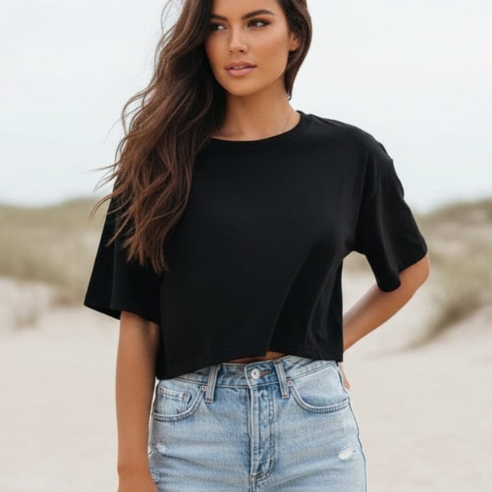 Fashionable women's crop top tee with short sleeves & round neck, ideal for trendy casual summer outfits.