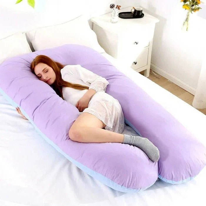 Ergonomic U-shaped pregnancy pillow provides customizable full-body support for expectant mothers.