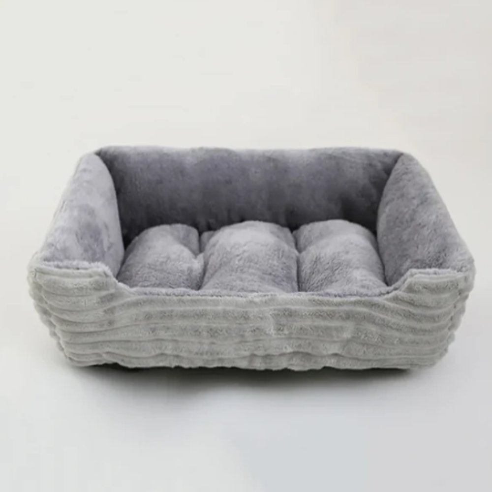 Ultra soft calming plush dog bed for cozy pet rest. Washable non-slip comfort pet furniture for all dogs.