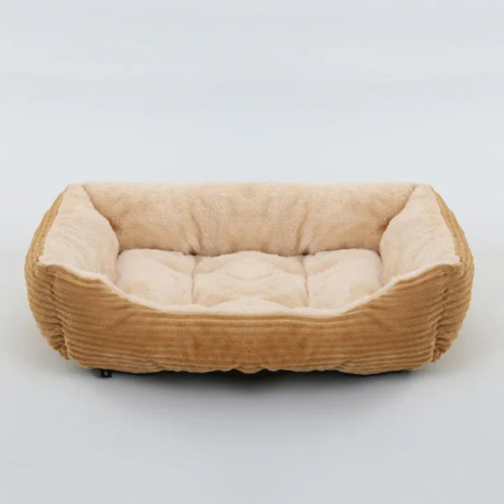 Large calming dog bed, ultra soft plush for ultimate comfort. Washable pet bed, cozy rest for your furry friend.