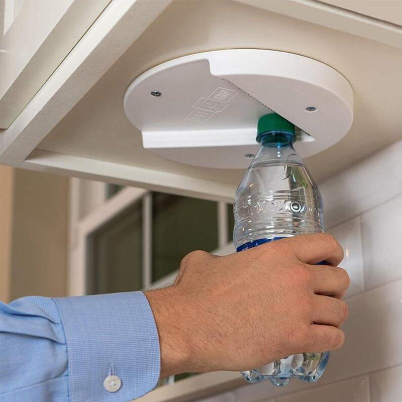 Accessible kitchen lid opener, mounts under cabinet, making jar opening simple for those with arthritis.