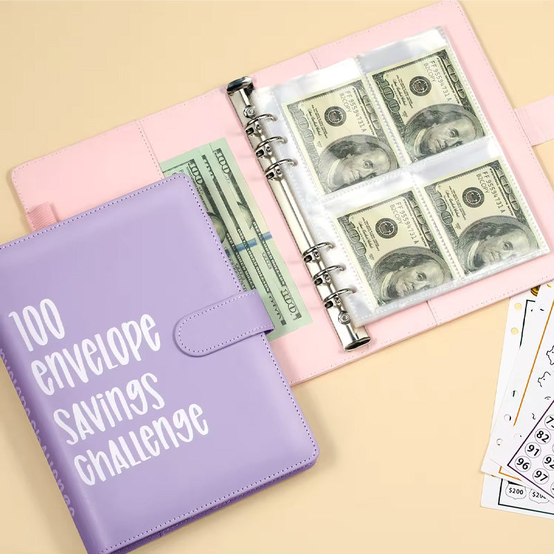 Someone putting money into an envelope of the 100 Envelopes Challenge Kit, for savings plan