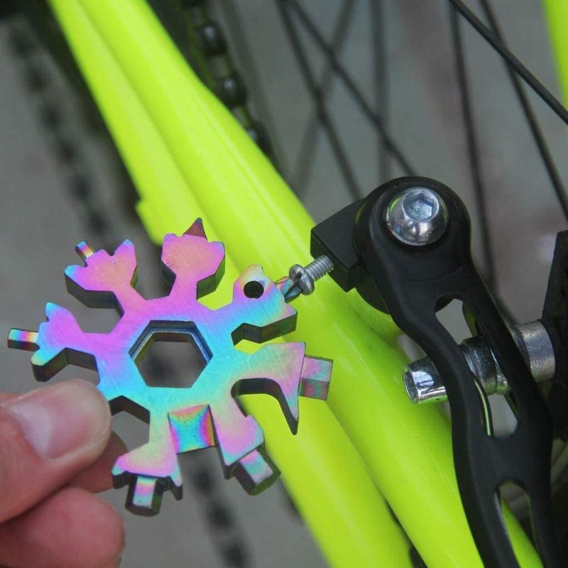 Front view of the snowflake multi-tool keychain, highlighting its unique shape & multi-functionality