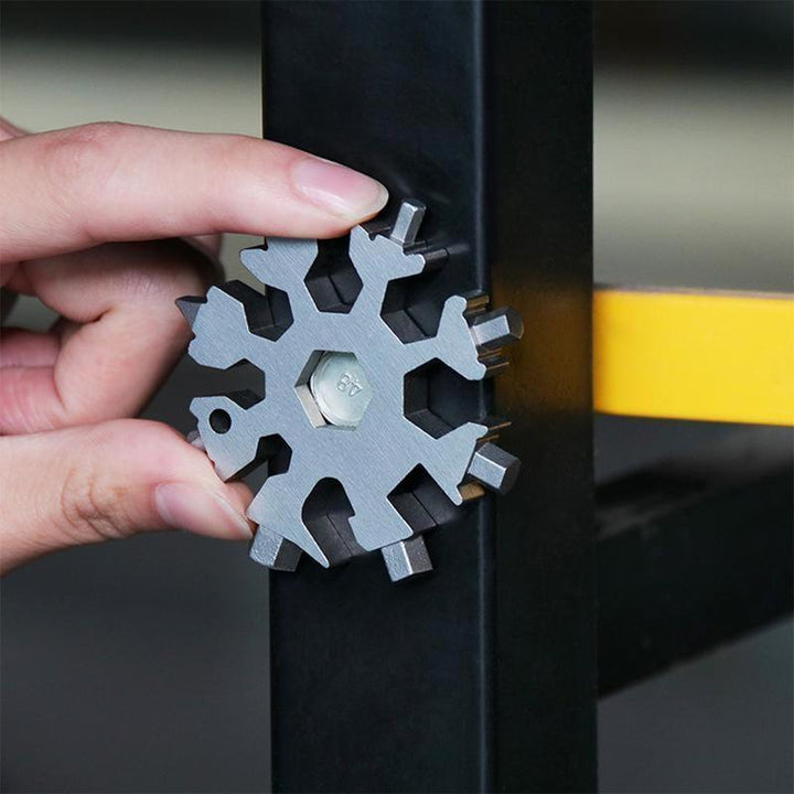 Ergonomic snowflake multi-tool, durable stainless steel, essential survival gear and portable tool
