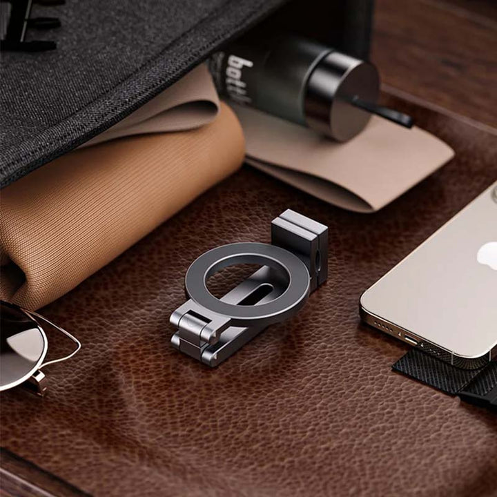 Compact universal magnetic phone stand, perfect for hands-free movie watching on the go