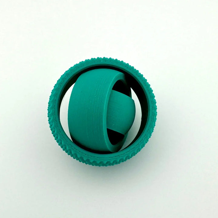 Unisex 3D Concentric Ring Fidget Ball being rotated, highlighting its fidget action