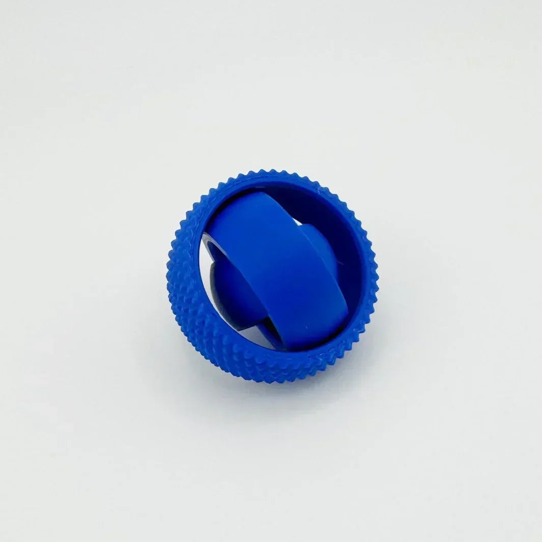 Unisex 3D Concentric Ring Fidget Ball Toy next to a hand for size comparison