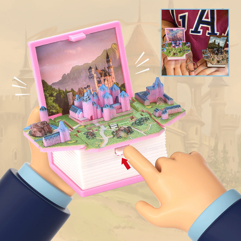 Hand holding a 3D Pop-Up Book Keychain, highlighting its compact size and novelty design
