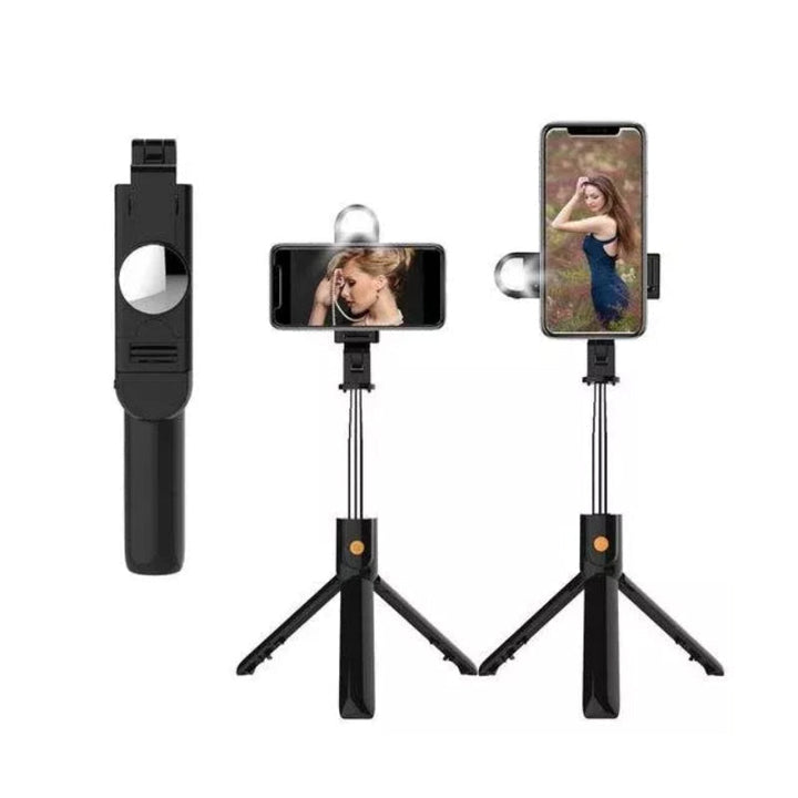 Extended Bluetooth selfie stick tripod with fill light holding a smartphone ready for use
