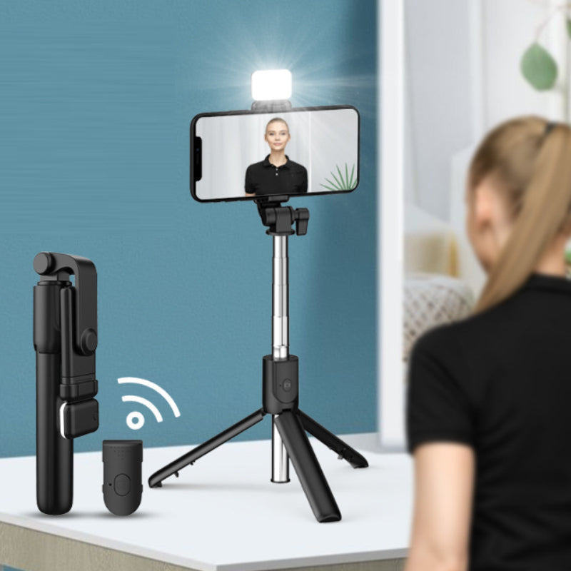 Tripod legs extended on the 6-in-1 Bluetooth selfie stick, stable for hands-free shooting