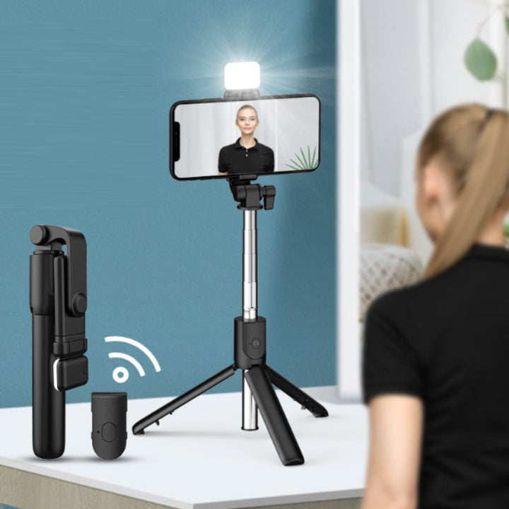 Tripod legs extended on the 6-in-1 Bluetooth selfie stick, stable for hands-free shooting