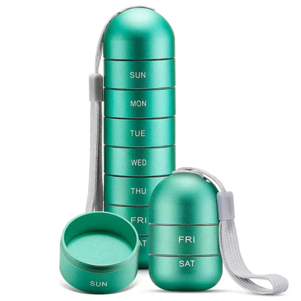 Travel-friendly waterproof aluminum weekly pill organizer. Portable metal medication case for daily health supplements.