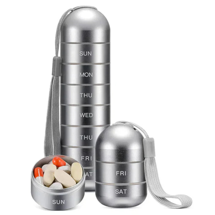Eco-friendly aluminum daily pill organizer. 7-day portable medication box for vitamins & supplements. Travel-friendly.