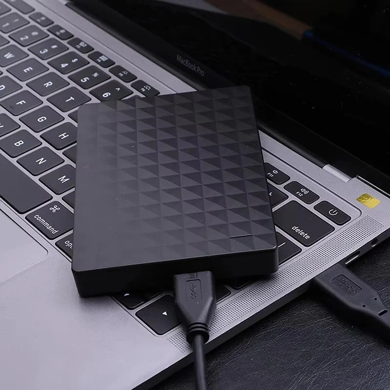 TavvitaImp011 8TB external hard drive connected via USB 3.0, ideal for fast data transfer & backup.