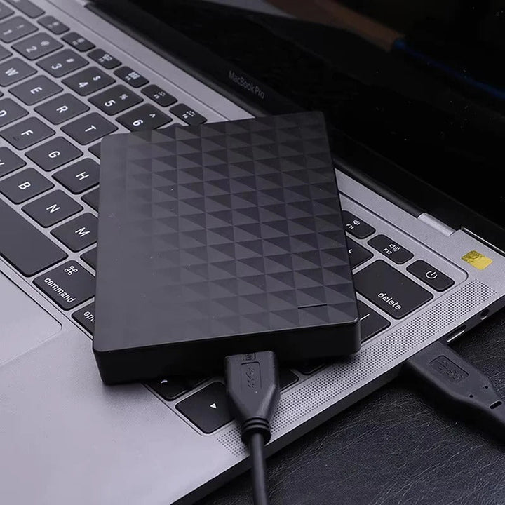 TavvitaImp011 8TB external hard drive connected via USB 3.0, ideal for fast data transfer & backup.
