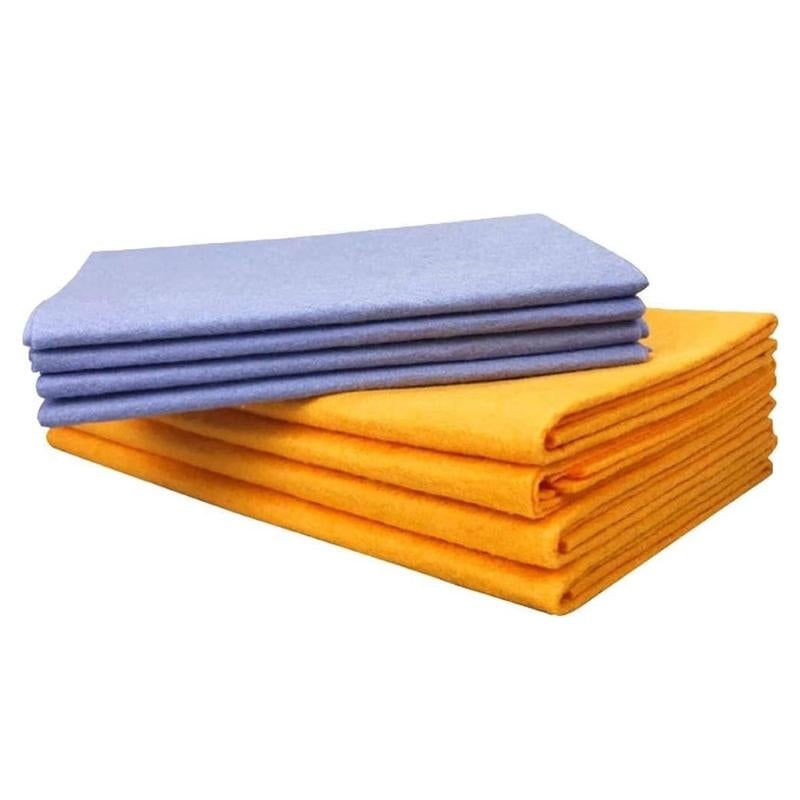 Non-woven absorbent towel in use, demonstrating its quick liquid absorption