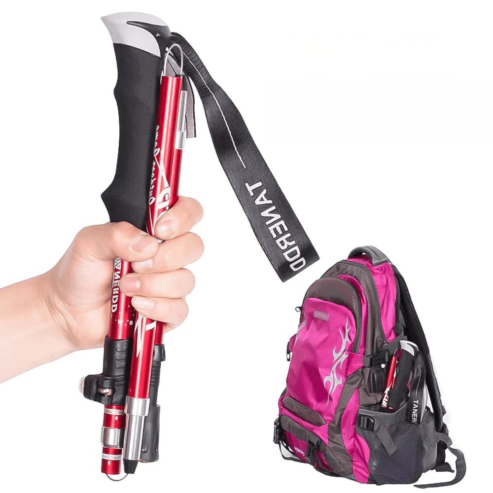 Hiker using adjustable trekking poles on a mountain trail. Essential lightweight walking sticks for outdoor adventure.