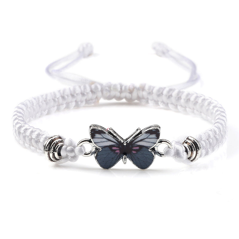 Adjustable handmade friendship bracelet with an elegant butterfly charm, comfortable and versatile.