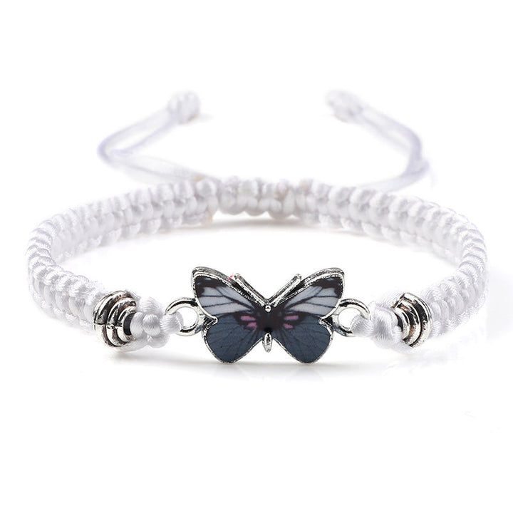 Adjustable handmade friendship bracelet with an elegant butterfly charm, comfortable and versatile.
