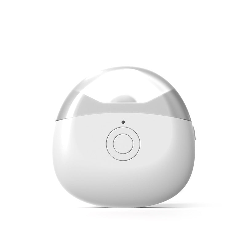 Electric nail clipper next to a smartphone, highlighting its modern design and tech-savvy features