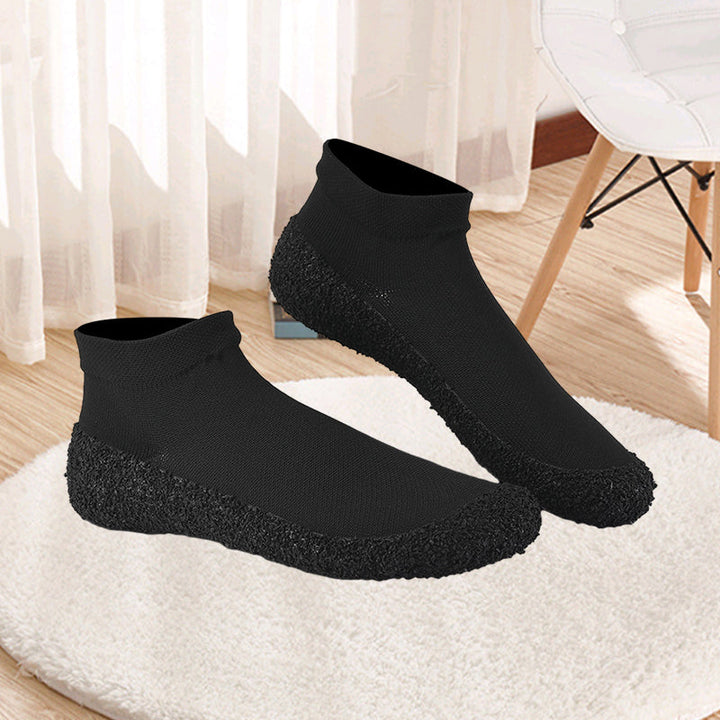 Minimalist yoga socks, providing a barefoot feel with added protection and grip.