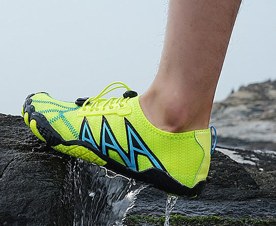 Flexible athletic water footwear, ideal for beach and outdoor fun. Quick-drying & barefoot.