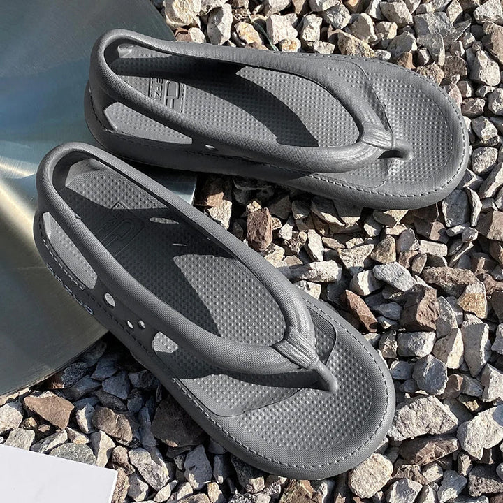 Unisex Beach Pool Slide Sandals drying by the pool, waterproof and quick-drying