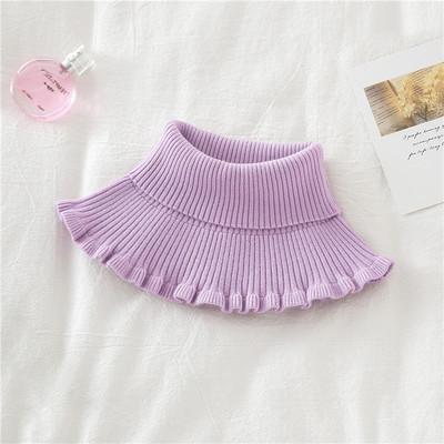 Unisex knit dickey collar styled under a jacket, showcasing its layering potential