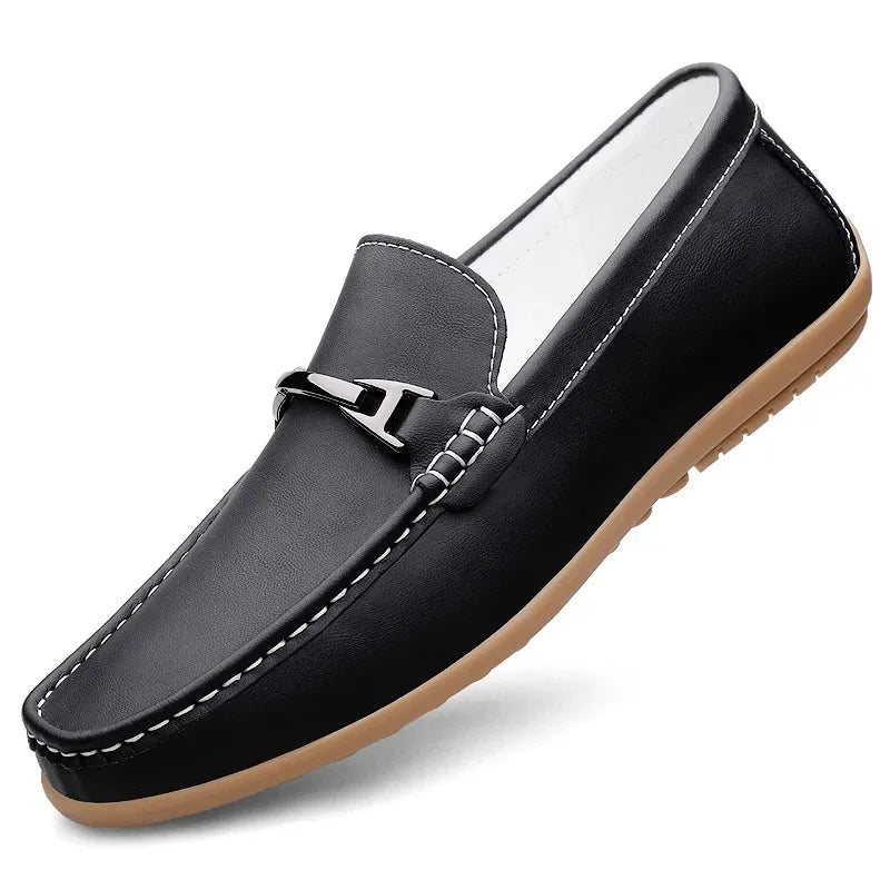 High-angle shot of a pair of unisex leather loafers, emphasizing their premium quality and finish.