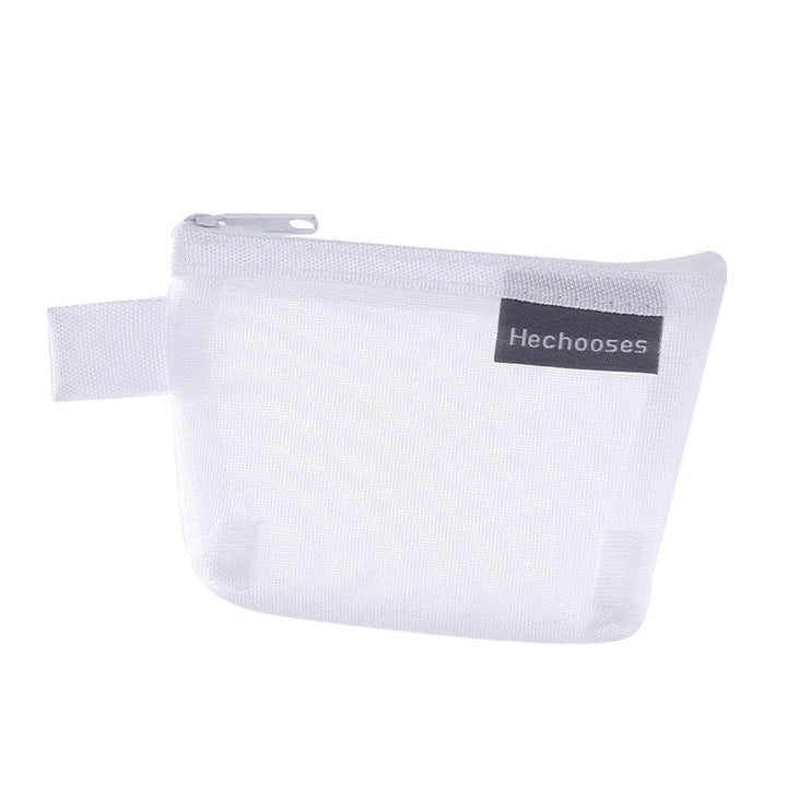 Mesh travel accessory bag with a robust zipper, perfect for keeping items secure.