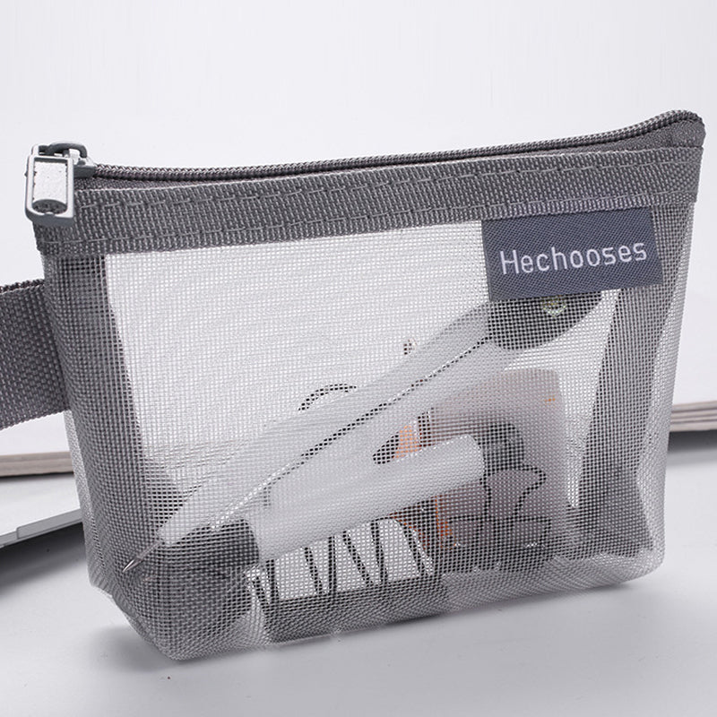 Versatile clear mesh pouch with zipper, suitable for office supplies or art materials.