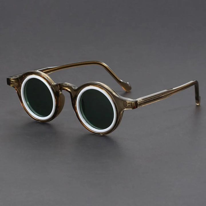 Stylish unisex sunglasses featuring a bold black round frame, ideal for fashion and UV protection.