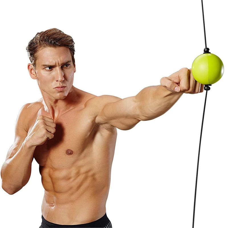 Athlete using a boxing reflex speed ball for MMA training and fitness exercises