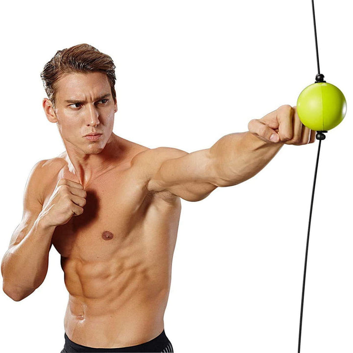 Athlete using a boxing reflex speed ball for MMA training and fitness exercises