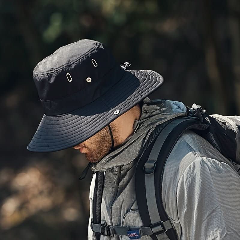 Foldable unisex travel sun hat with UV protection. Breathable headwear for hiking, fishing & summer camping. Adjustable fit.