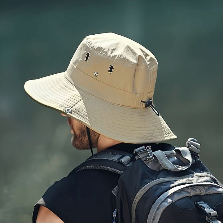 Adjustable unisex outdoor sun hat providing UV protection. Perfect breathable headwear for travel, hiking & summer adventures.
