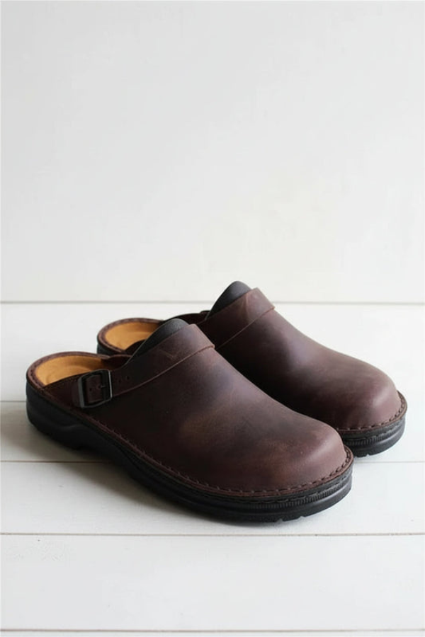 Comfortable coffee brown unisex slip-on clogs with ergonomic design. Supportive footwear for daily casual use.