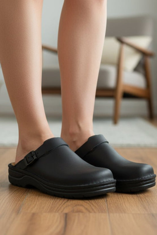 Comfortable brown unisex clogs, easy slip-on style. Supportive footwear for casual outings or professional settings.