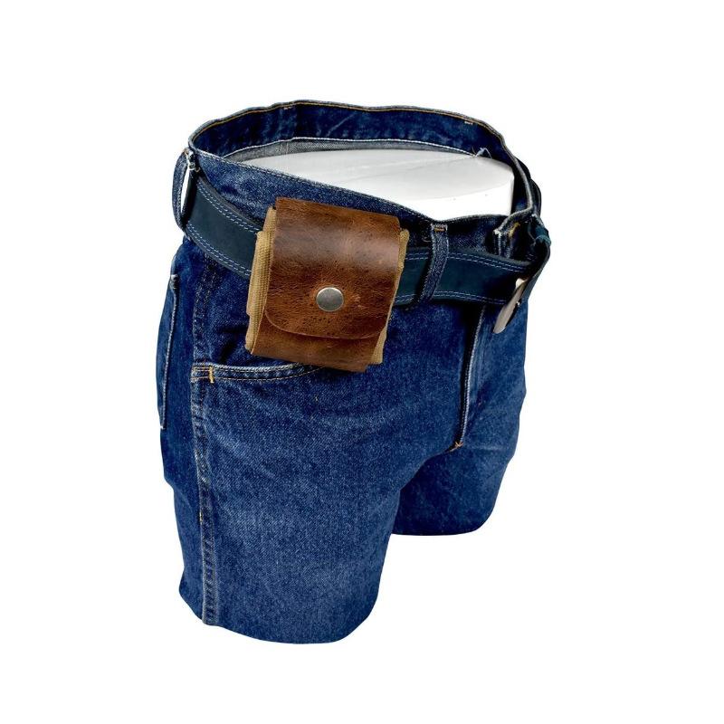 Foldable canvas and leather pouch with an antique brass button, essential for camping and bushcraft.