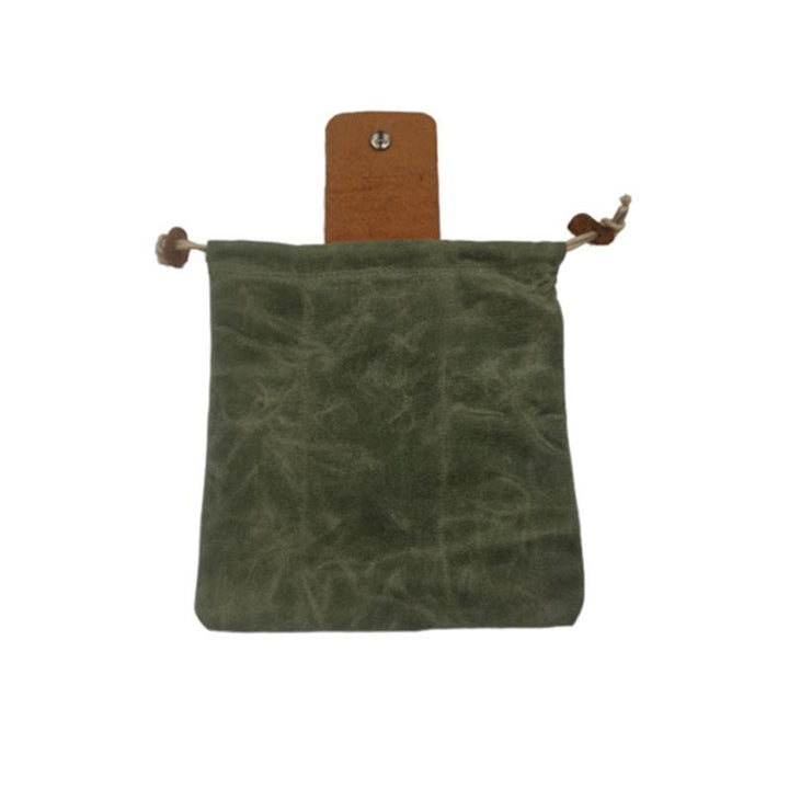Handy leather and canvas bag, perfect for carrying small treasures found during outdoor foraging.