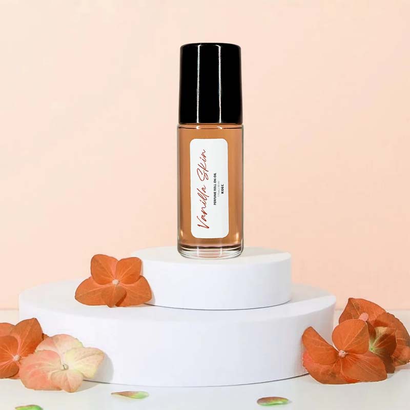 Unisex Captivating Roll-On Fragrance Oil, infusing peach and vanilla for a unique, confidence-boosting aroma.