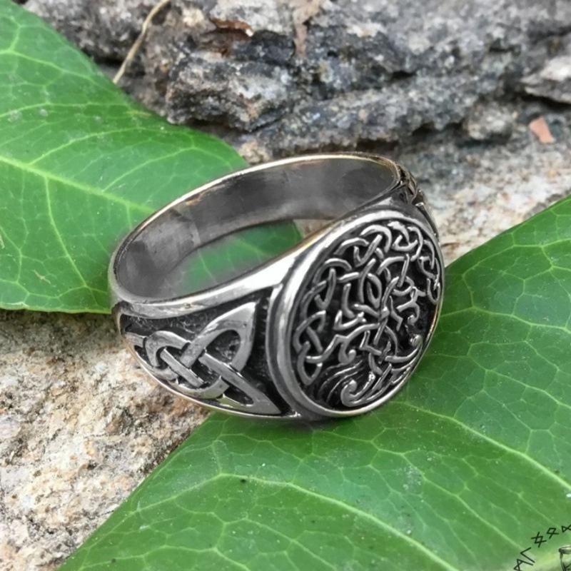 Stylized unisex Celtic Tree of Life ring showcasing intricate design, a fashionable silver accessory.