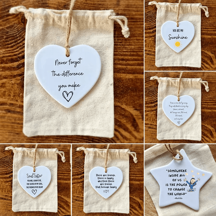 White glazed ceramic heart ornament, a thoughtful keepsake with an inspirational quote for any occasion.