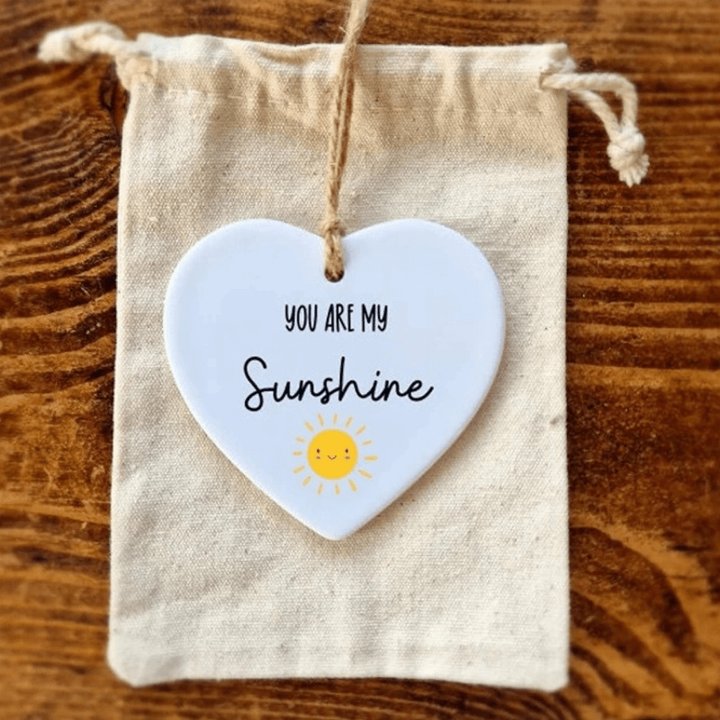 Polished ceramic heart keepsake, a tangible reminder of appreciation or friendship, with a special quote.