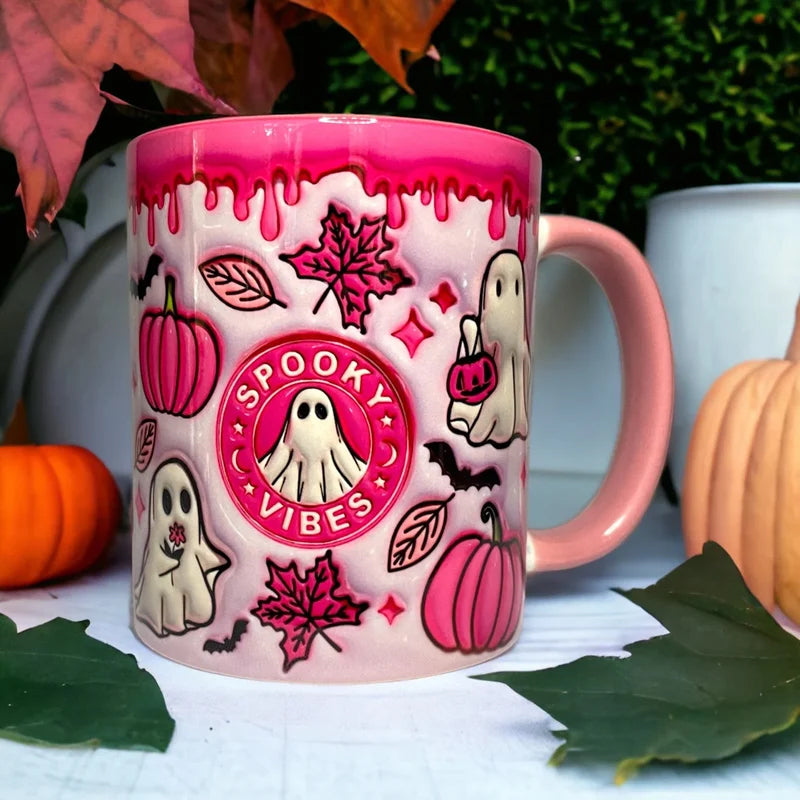 Pumpkin-themed ceramic coffee mug with a playful ghost, perfect for Halloween parties or as a daily autumn mug.
