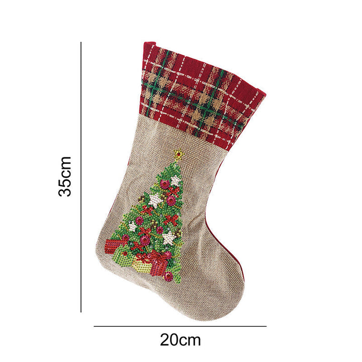 Adult hands working on the Diamond Art Stocking, a relaxing and engaging DIY holiday craft