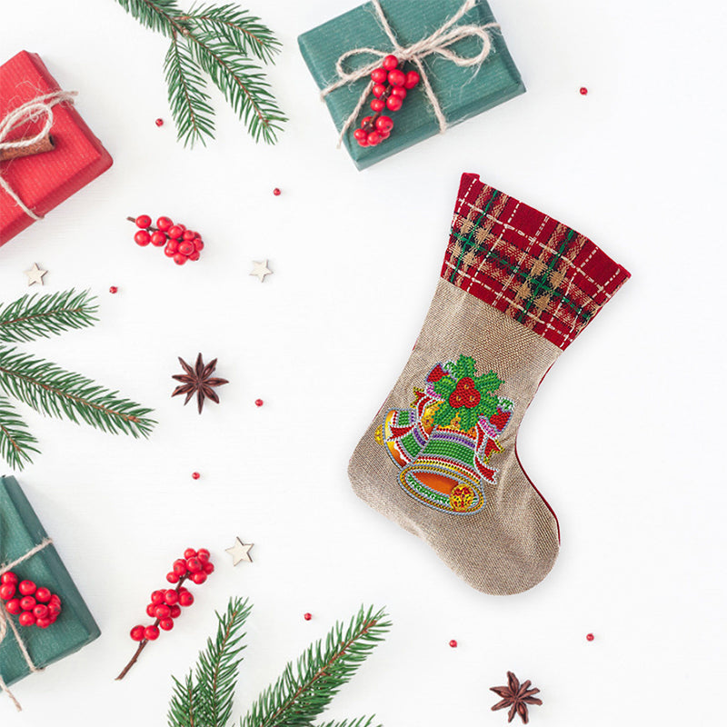 Kit contents for Christmas Diamond Art Stocking, including fabric, diamonds, tools, and instructions